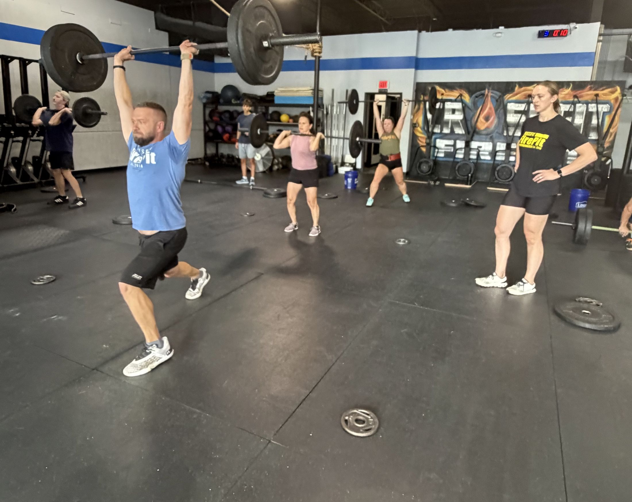 Athletes training on the floor at CrossFit FirePit in Greensboro, North Carolina